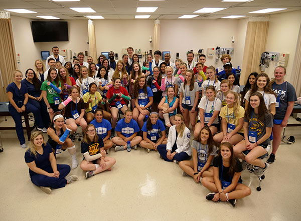 Campers mingle with physician assistant students. Photo by Christopher J. Leigh, video production coordinator.