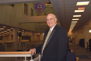 Roger A. Madigan, in the library that bears his name