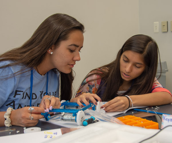 On Day 1, SMART Girls dive into to assembling their robots.