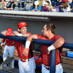 Speicher talks with left fielder Ben Aklinski, who batted in one of the Crosscutters' runs in the 6-4 loss.