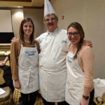 Chef Paul Mach, co-host of “You’re the Chef” on public television, poses with attendees of the Pennsylvania Association of Family & Consumer Sciences.