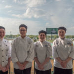 On Wednesday, three days before the Derby, students, from left, Bridget M. Callahan, of Pottsville; Bailey L. Frey, of Watsontown; Bethany R. Taylor, of Moosic; and Stephanie C. Myers, of Catawissa, step away from the kitchens to take in the world-famous track.
