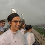 Culinary arts and systems student Jacob W. Parobek, of Seltzer, joins classmates to watch the storied Kentucky Derby from a rainy rooftop.