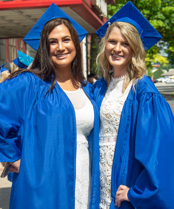 Soakin’ in the summer sunshine and satisfaction are: Alanna M. Vanemon (left) and Milanka Tomasevic. The duo earned health arts: practical nursing emphasis degrees. 