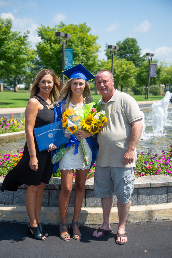 The entrance fountain and florals offer a gorgeous setting for photos of Kierstin R. Goodby and her parents. Goodby, of Jersey Shore, graduated in health arts: practical nursing emphasis. 
