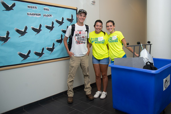 Flocking into Dauphin Hall! Tim M. Frey, a diesel technology student from Blandon, finds a welcome new home and move-in support from Leah M. Hesidence (center), of Karns City, applied health studies: radiography concentration, and Emma K. Pingel, of Beach Lake, dental hygiene. 