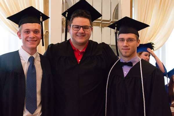 Marking their big day are (from left) Gunnar C. Larsen, information technology sciences-gaming and simulation; Jonathan J. Lopatofsky, information assurance and cyber security; and Lucas H. Bower, physician assistant.