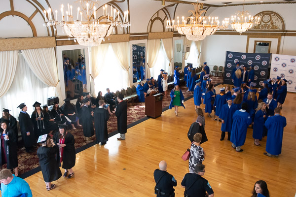 Soon-to-be-graduates, not to mention a celebratory air, fill a Genetti Hotel ballroom.