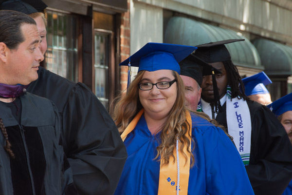 Joining classmates in the procession is applied human services major Estee E. McLaughlin, of Muncy.