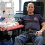 Patrick M. Breen, in the midst of a "Power Red" blood donation in April 2006. (File photo)