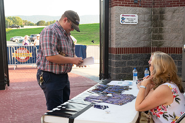 Donny J. Reisch, of Lititz, majoring in building science and sustainable design: architectural technology concentration, stops by the Community Theatre League table, part of the Crosscutters' 