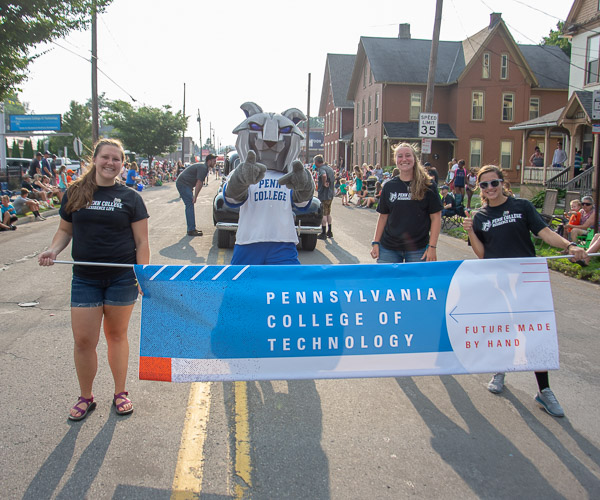 A group ready to greet the world: Olivia J. Hawbecker, of Chambersburg; the Wildcat; Lauren S. Herr, of Lititz; and Cathy E. Gamez, of Williamsport.