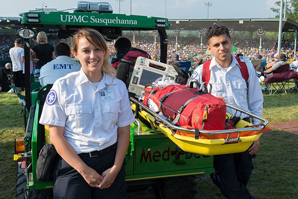 Penn College emergency medical services students Michelle K. Waughen, of Montgomery, and Ali T. Alnasir, of Williamsport, stand ready to provide to provide care to those in attendance at the 2017 Little League World Series. Penn College students pursuing careers as physician assistants and paramedics are providing health care at the 2018 World Series.