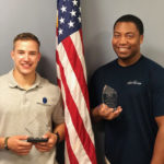 Omega Delta Sigma's national awards are celebrated by member John A. Gondy (left), of Glenmoore, a residential construction technology and management: architectural technology concentration student, and chapter President Efrem K. Foster, an applied management major from Williamsport.