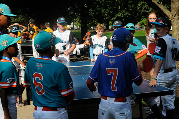 Pingpong proves a popular addition to the schedule, an opportunity to kill time between the cookout and parade.
