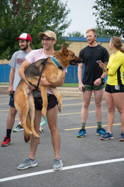 In his comfort zone is the aptly named Major, getting a calming pre-race hug from Corey J. Carr, a heating, ventilation and air conditioning technology student and member of the U.S. Army Reserve.