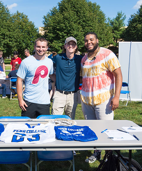 Representatives of men's lacrosse, among Penn College's roster of club sports, stand ready to recruit.