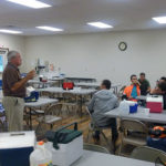 Don Remmey provides an overview of his pallet-making operation for Penn College forestry students ...