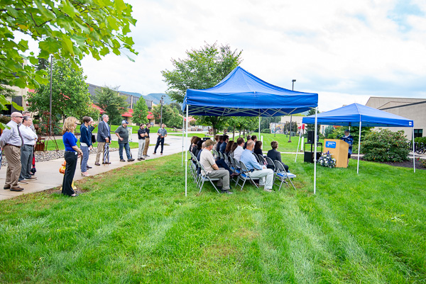Attendees gather under tents and along the main campus mall to commemorate a much-valued friend of Penn College.