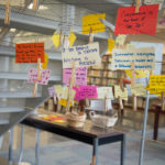 A “Thought Cloud,” located under the Madigan Library’s first floor open staircase, offers visitors a way to reflect on the “Mindful” exhibit and share positive messages with others. 