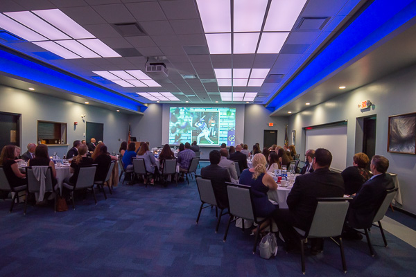 A slideshow of the newest Hall of Famers' athletic careers plays in the newly renovated Thompson Professional Development Center’s Mountain Laurel Room. 