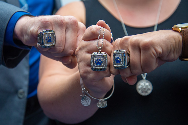 The bling is the thing! Hall of Fame inductees show of their rings and necklace. 