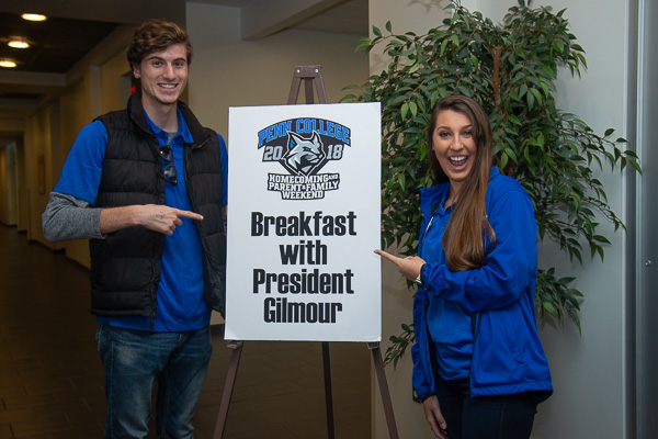 Pointing the way to morning munchies are student leaders Ethan M. McKenzie, a software development and information management student from Muncy, and Lindsey A. King, applied health studies, of Hanover. 