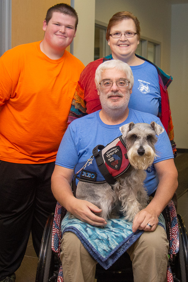 Reo, the service dog of Ryan S. McCrickerd’s father, Bryan, was among guests enjoying Breakfast with the President. McCrickerd, also joined by his mother, Roseann, is an aviation maintenance technology student from Bethlehem. 