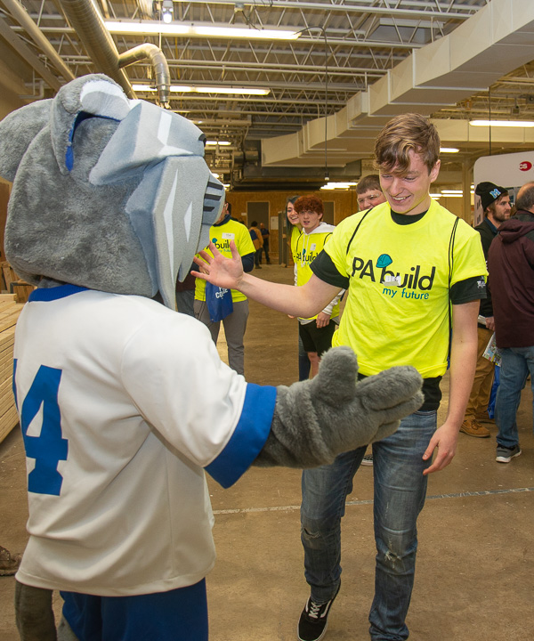 More Wildcat paw-to-hand greetings in the construction lab 