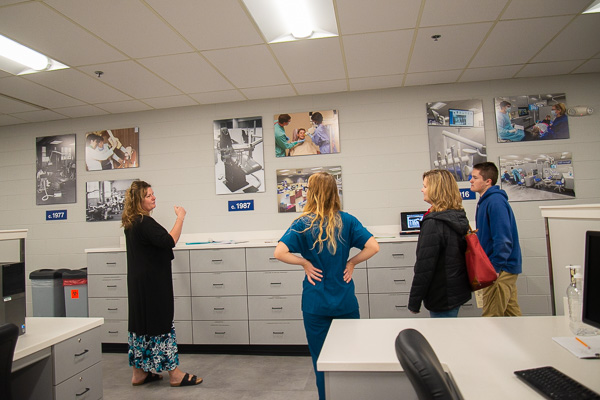 The evolution of the dental hygiene program and its labs (circa 1977, 1987 and 2016) are pointed out by Barbara K. Emert-Strouse (left), assistant professor of dental hygiene. 