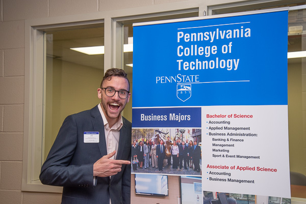 Business-ready! Alumnus Caleb G. Schirmer, ’14, landscape/horticulture technology: landscape emphasis, and ’16, applied management, returns to his alma mater to help guests. 