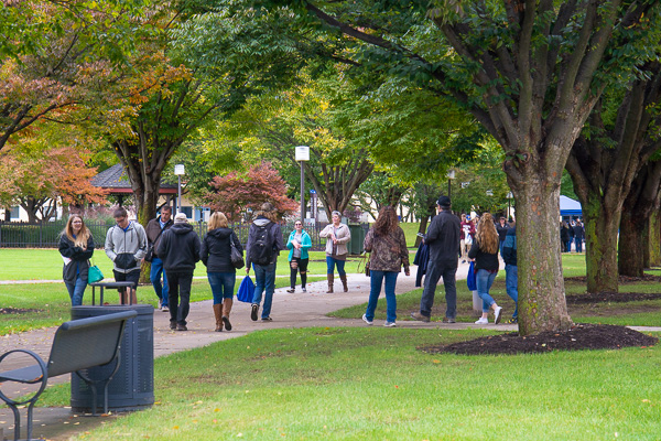 Still holding onto “the green” – with just a touch of autumn – campus walkways brim with activity. 