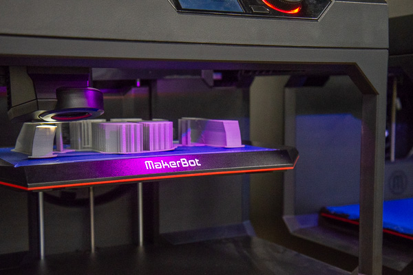 A Makerbot basks in the glow of purposeful creation.