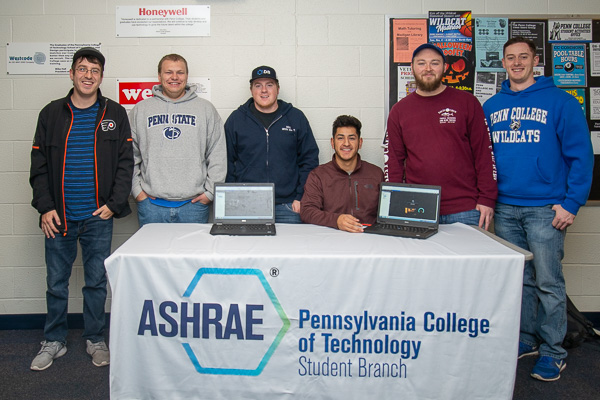 Reppin’ ASHRAE! Members of the student chapter of heating, refrigerating and air conditioning engineers stand ready to offer Open House assistance. 