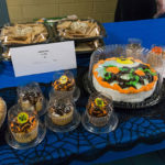 Alyssa L. Fink, assistant baker in Dining Services, brought cannoli, cakes and such to the table.