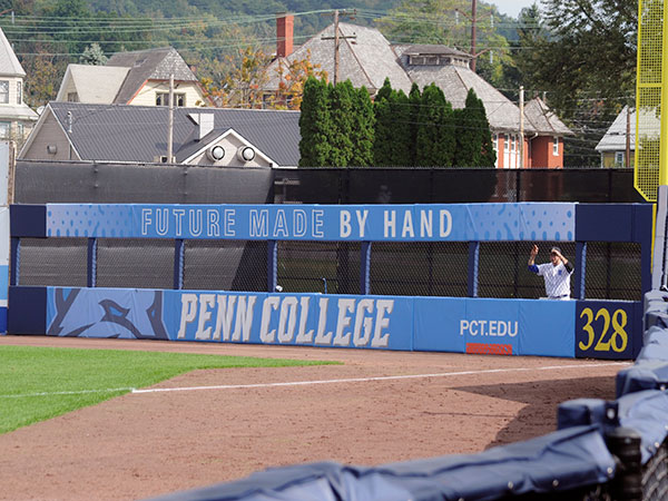 ... befitting the college branding on the right-field bullpen.