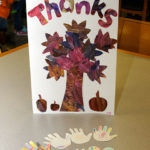 The children delivered a handmade "thank you" and commemorative greeting cards that they're handing out to students and employees in their campus travels this week.