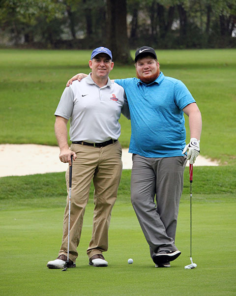 Ian J. Schoenleber, '17, automotive technology: Honda PACT emphasis,, enjoys a round of golf with his father, Joseph.