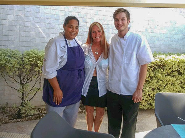 Pennsylvania College of Technology culinary arts and systems students Amaris T. Smith (left) of Williamsport, and Dylan H. Therrien, of Reading, pause from their internship work in the kitchens of French Riviera luxury resort Le Mas Candille to join Therrien’s mother, Tracey.