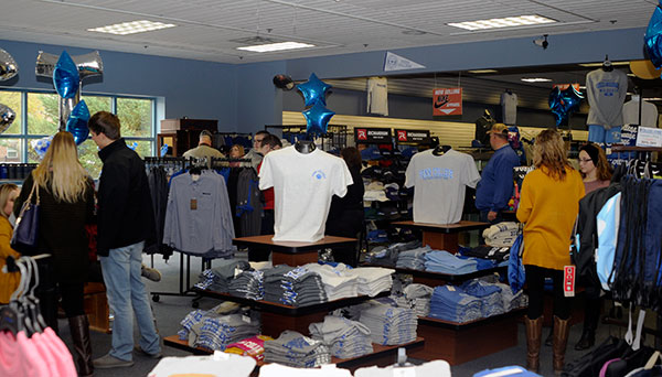 Creating their Wildcat Wardrobe for fall, customers scour The College Store's inventory.