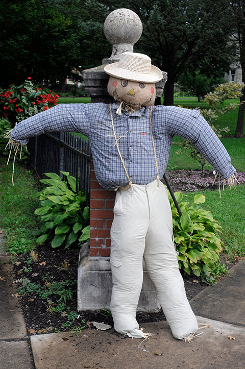 A ponytailed farmer – humorously modeled after Dennis P. Skinner, an assistant professor of horticulture – greets visitors at the northwest corner of the intersection.