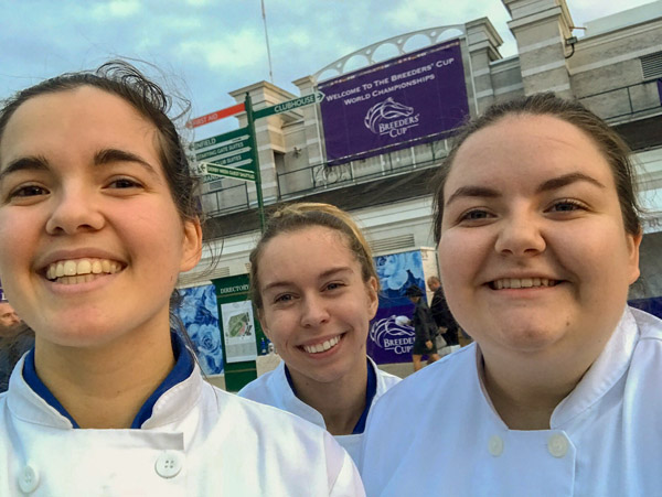 From left, students Gloria F. Boronow, of Denver, baking and pastry arts; Mefferd, of Boyertown, culinary arts and systems; and Hailey R. Dunn, of York Haven, culinary arts and systems, gather for a photo outside of Churchill Downs.