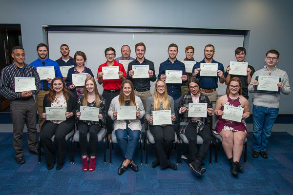 Future leaders pose with their certificates …