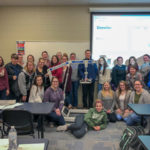 Students join Matt Emmerling, of Sizewise Durable Medical Equipment Co., who brought bariatric equipment to campus for students to try.