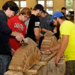 Keith C. Long, of Pitman, leads Penn State students through a long-standing crowd-pleaser: archway construction. Long is enrolled in building construction technology: masonry emphasis.