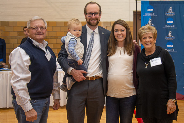 Wildcat Club members Ed and Linda Alberts (far left and right) get acquainted with the family of Kyle A. Smith, executive director of the Penn College Foundation. 