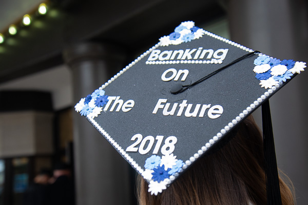 A banking and finance grad's cap takes a bullish look at the road ahead.
