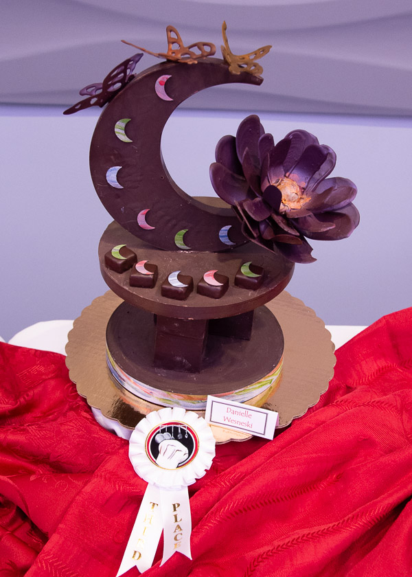 Butterflies flit across a third-place chocolate piece by Danielle R. Wesneski, of Williamsport.