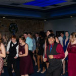 The crowd dances to "Cotton Eye Joe."