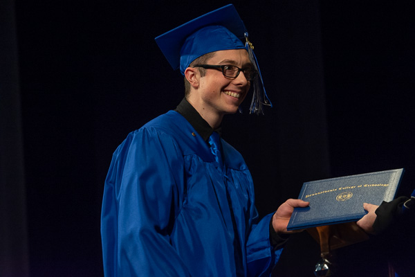 Anson T. Spisak, of Corning, N.Y., receiving associate degrees in on-site power generation and diesel technology